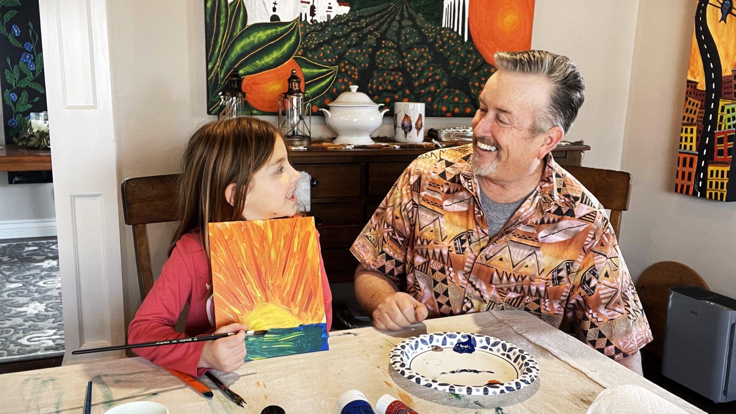 Ellie Morris and Guy Wann painting together